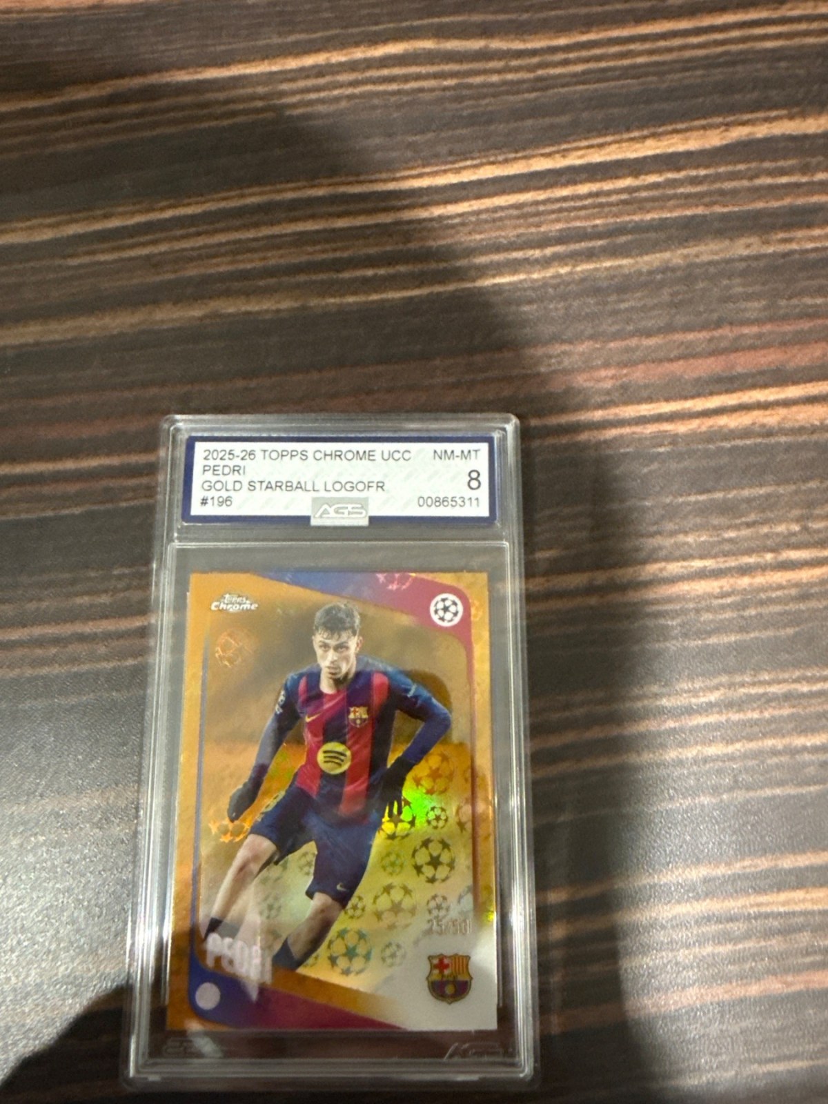 Reference image of Pedri 2025-26 Topps Chrome UCC Gold Starball Logo Refractor